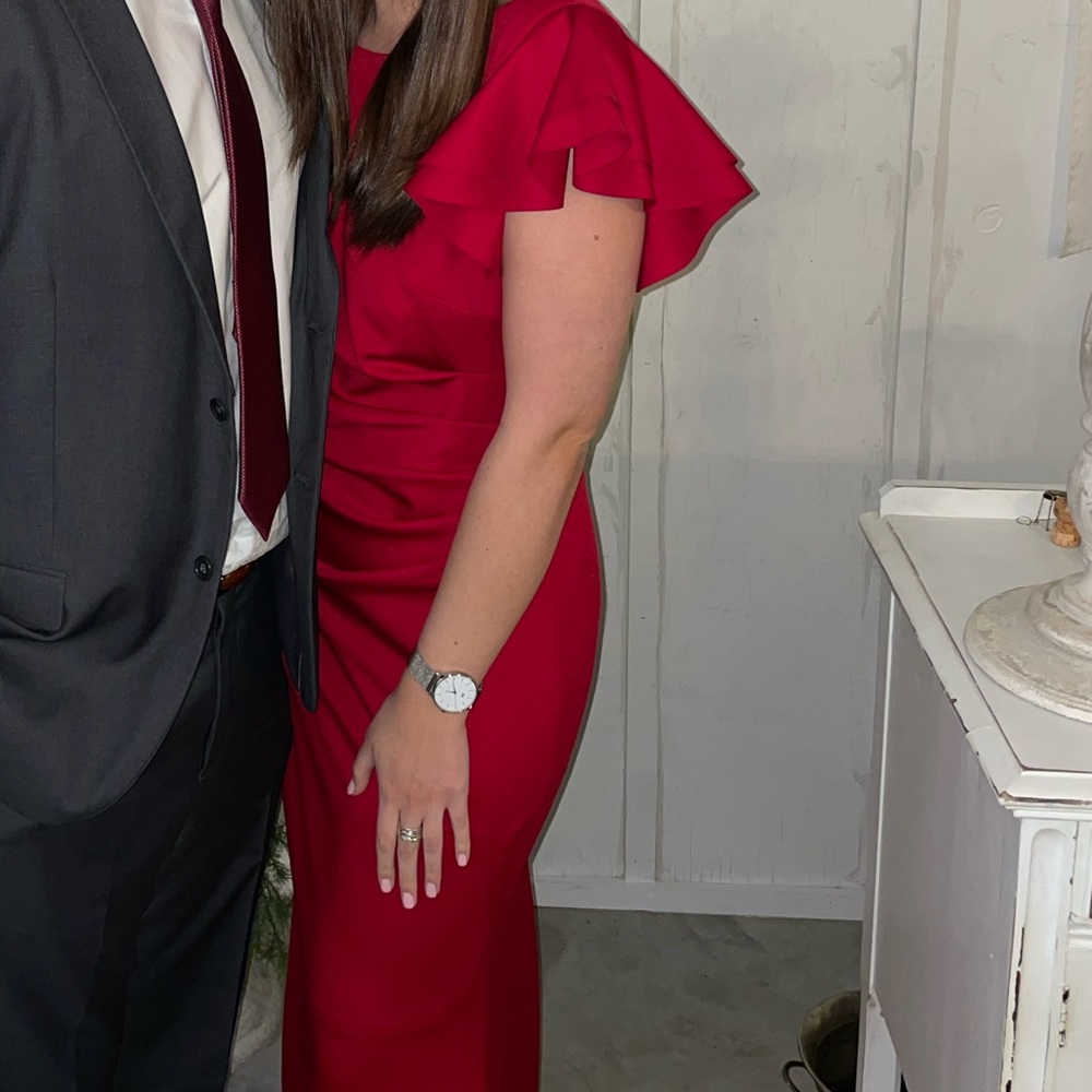 Selling this formal dress! Worn once. It is a tight material, fits a size 12.